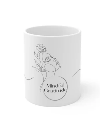 White coffee mug that says Mindful and Gratitude